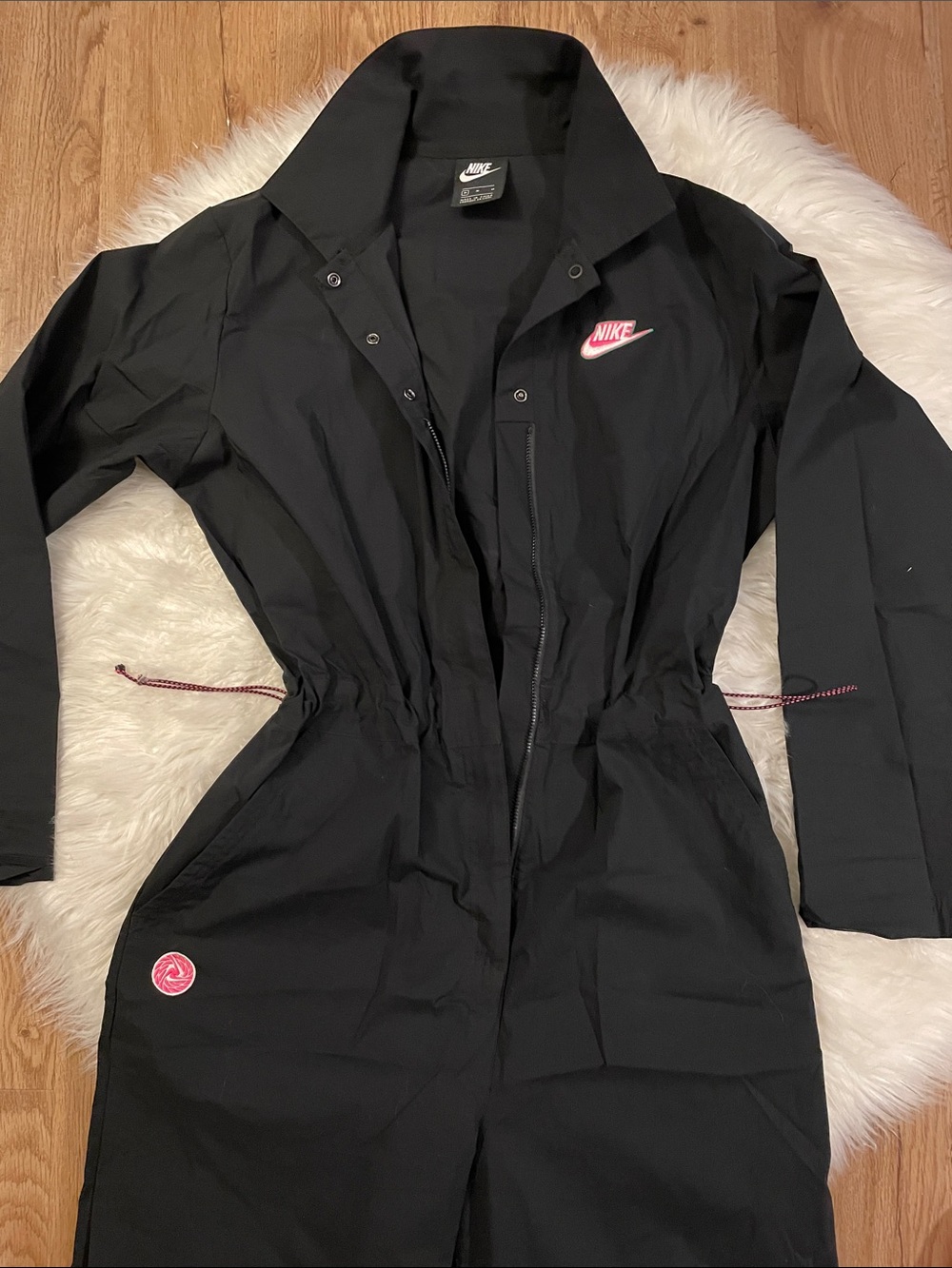 Nike Women's M Charcoal utility jumpsuit. Imperfection, elastic cord has split i